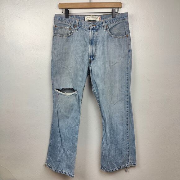Vintage Levi's 567 Loose Boot Cut Jeans Mens 32x30 Light Wash Distressed Y2K Vtg - Picture 1 of 13